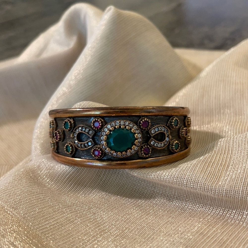 Artisan bracelet cuff with precious stones.